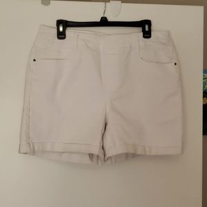 Pink pull on shorts, no zipper to lladd bulk in the front. Medium weight denim